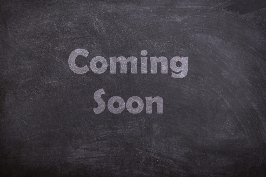 "Coming soon" written on chalkboard